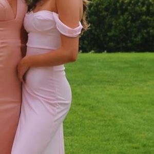 Wore once to my prom, about an inch of the bottom stained from dragging